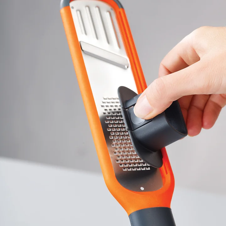 Joseph Joseph - Handi-Grate 2-in-1 Mini-Reibe und -Hobel, orange