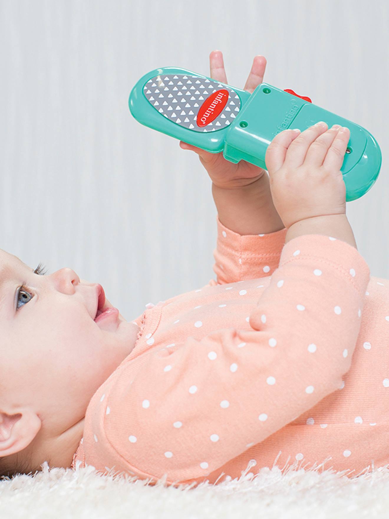 Capa para celular e chave eletrônica Infantino Multicolorida