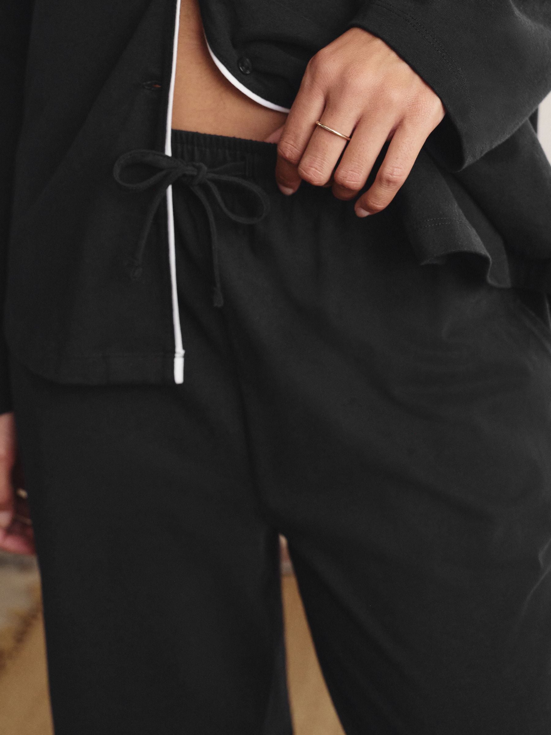 Zwart - Pyjama met knopen en jerseystof