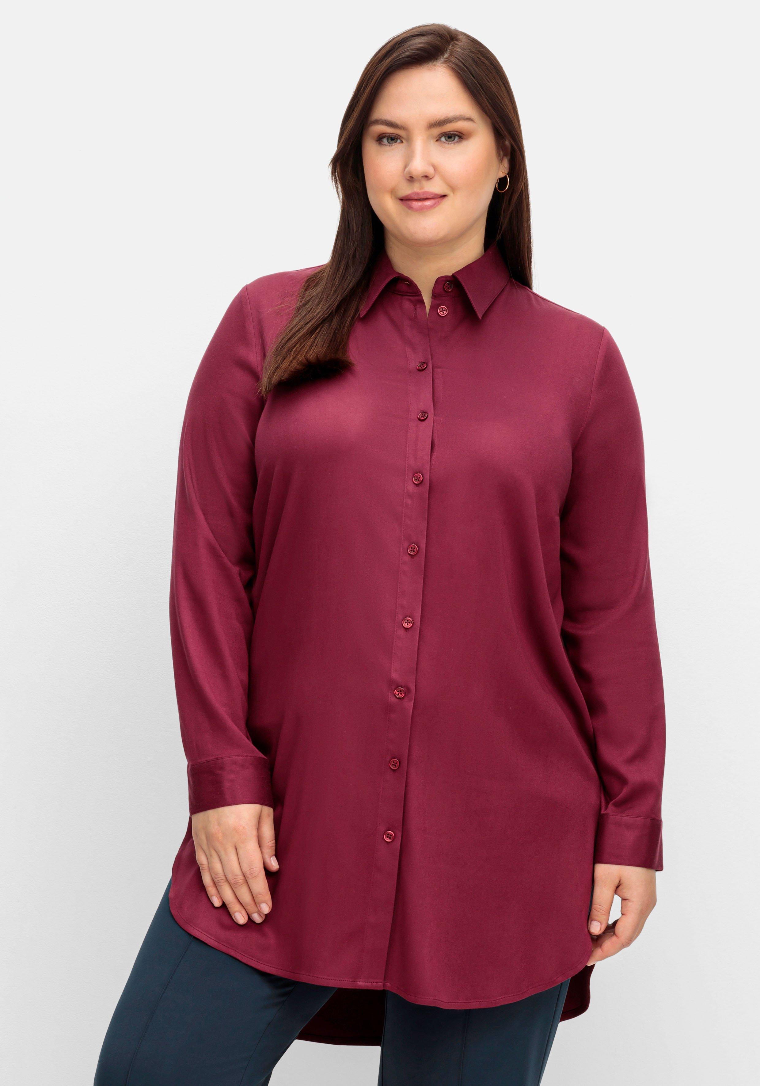 Leicht glänzende Longbluse mit gerundetem Saum