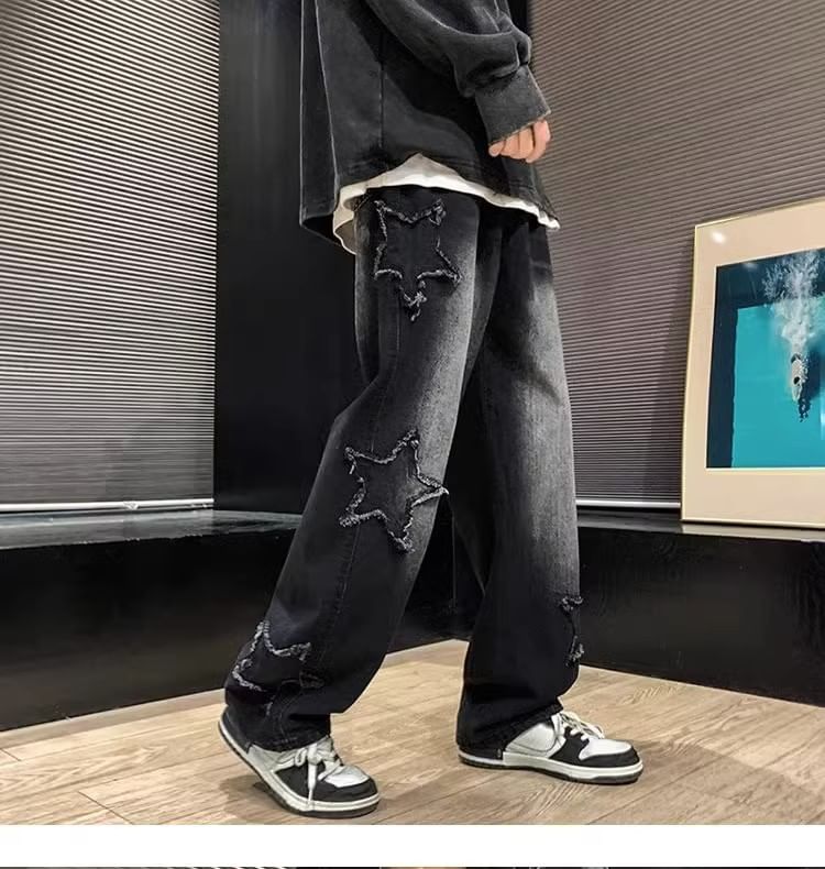 Antaeus - Lage taille jeans met sterrenapplicatie en wijde pijpen