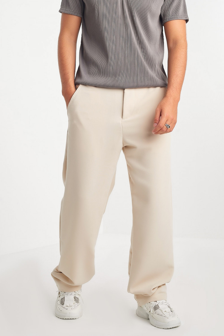 Pantalon beige coupe large