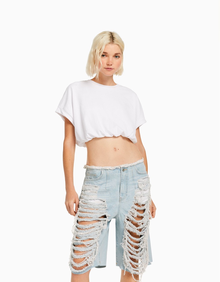 Bermuda jeans rasgada