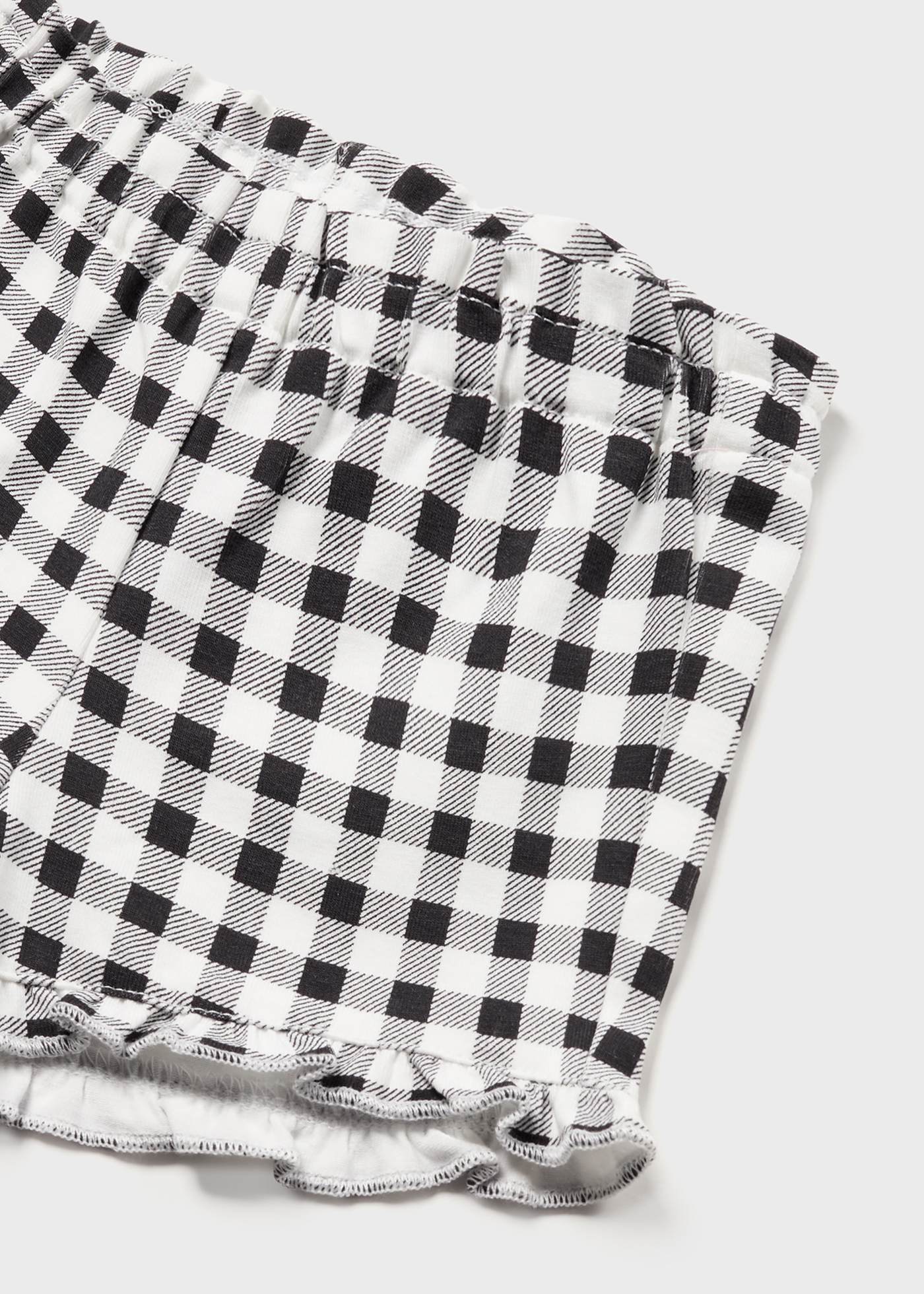 Conjunto de 4 peças em algodão sustentável para recém-nascidos.