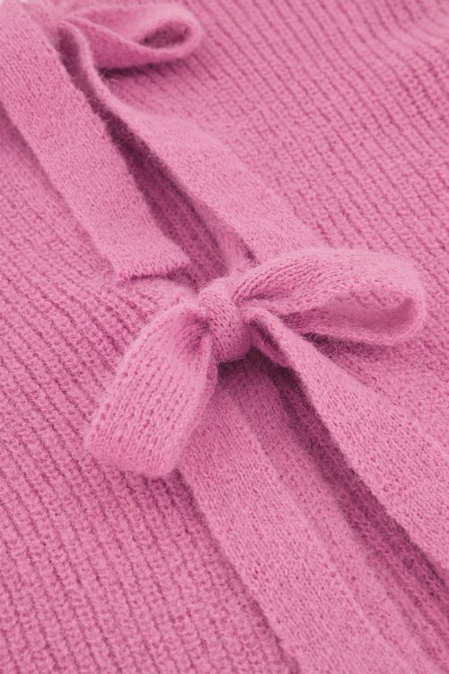 Roze gebreide trui met strikken