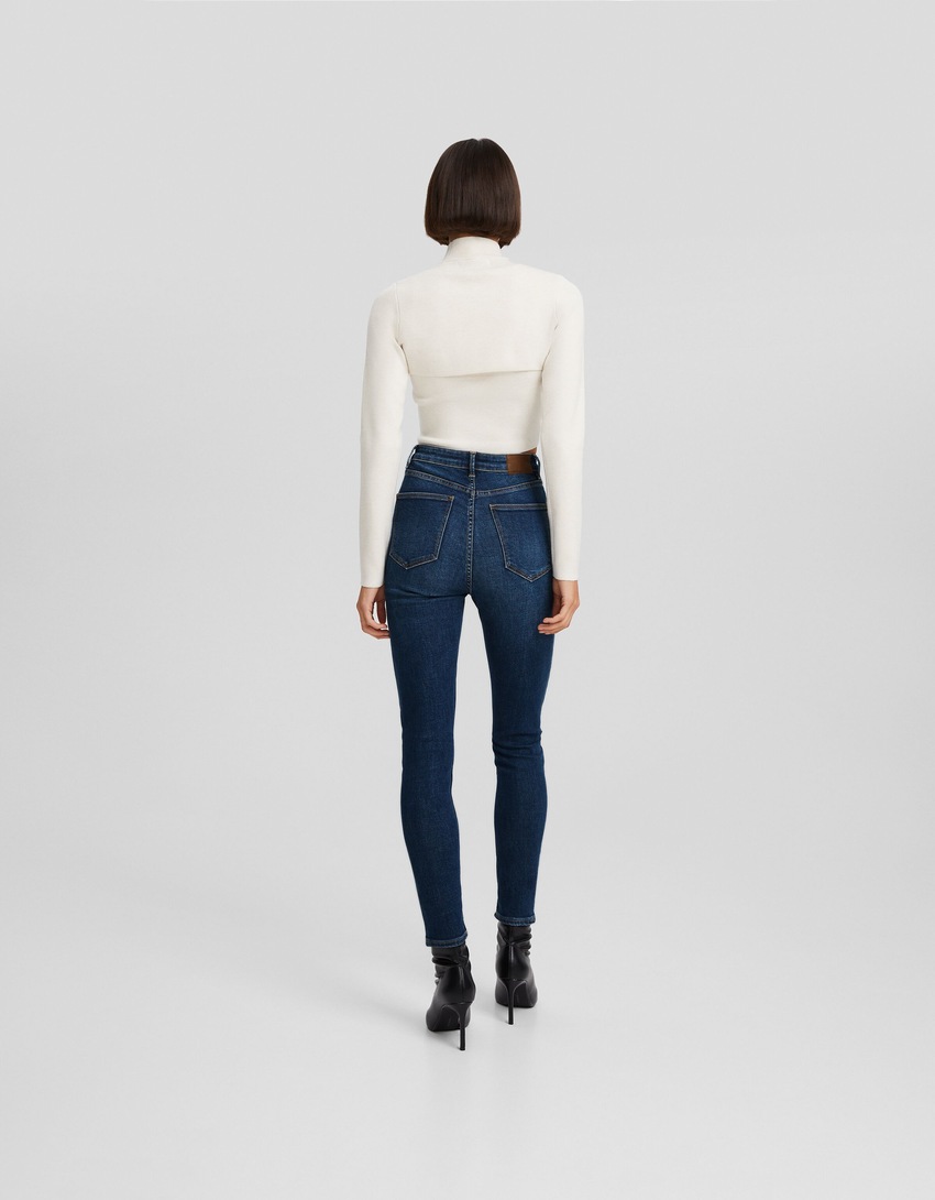 calça jeans skinny de cintura super alta