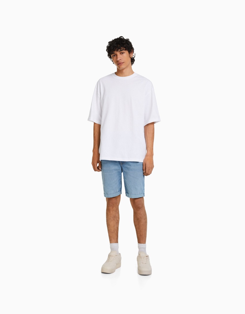 Bermuda jeans skinny com barra dobrada