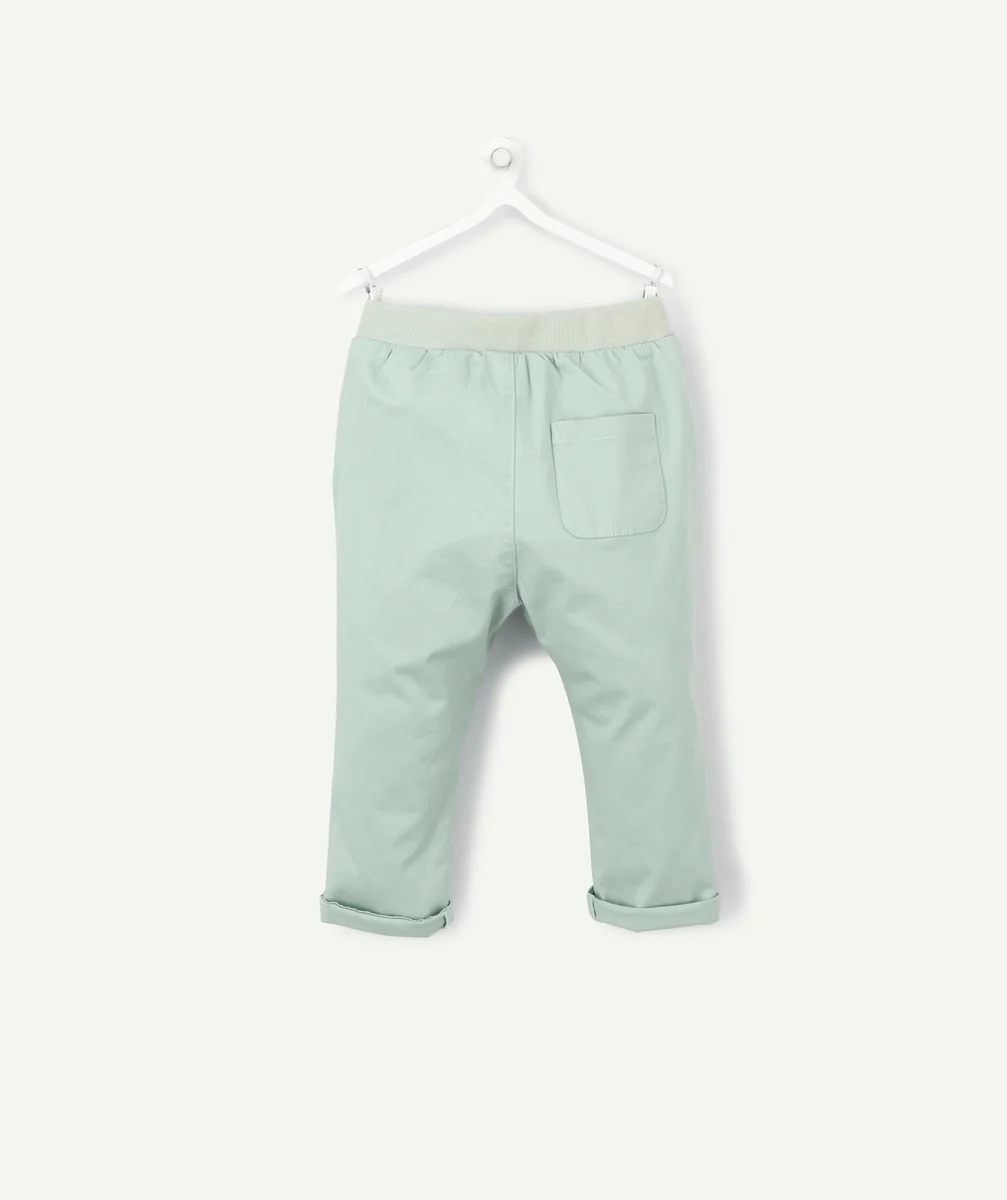 LE PANTALON SAROUEL VERT EN TOILE DE COTON