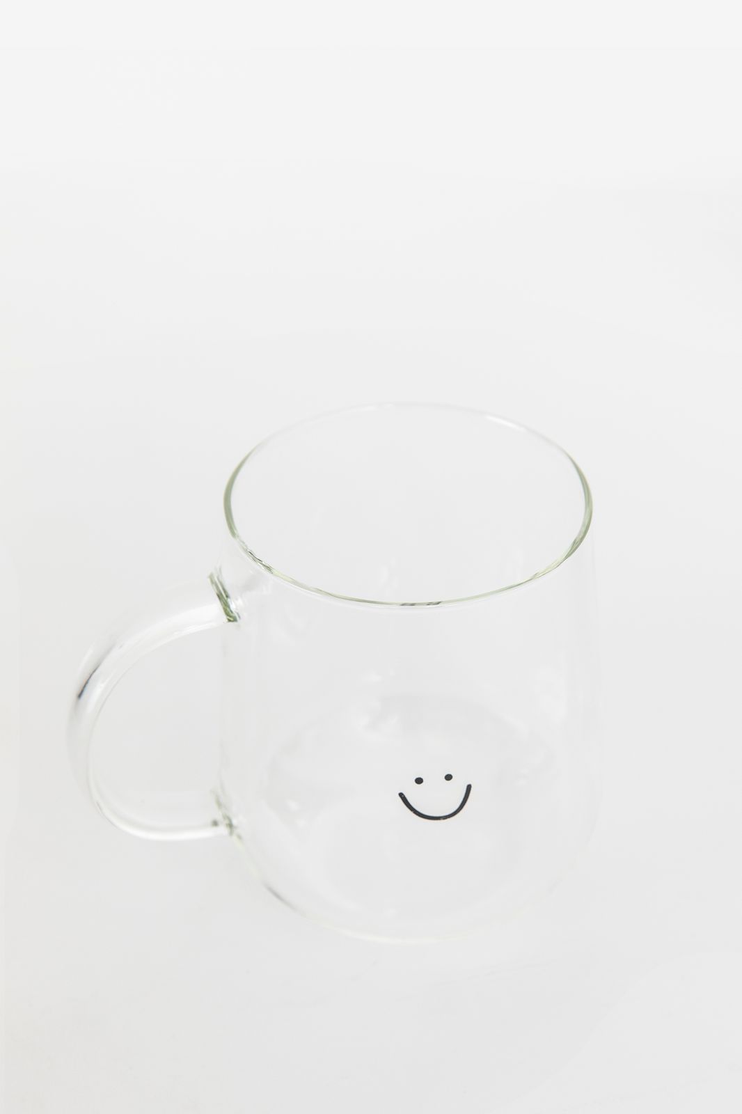 Theeglas met smiley