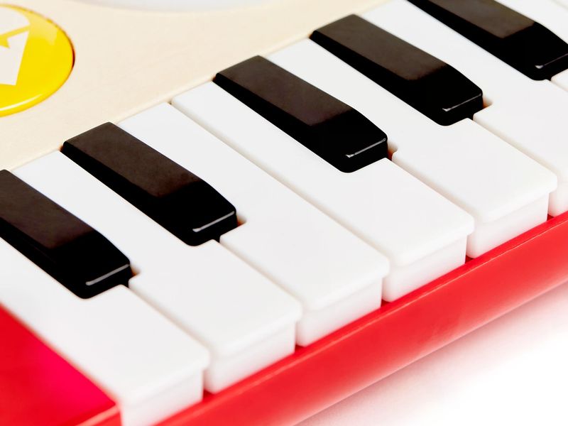 Hape Musikspielzeug DJ-Mischpult Batteriebetriebenes Musikinstrument