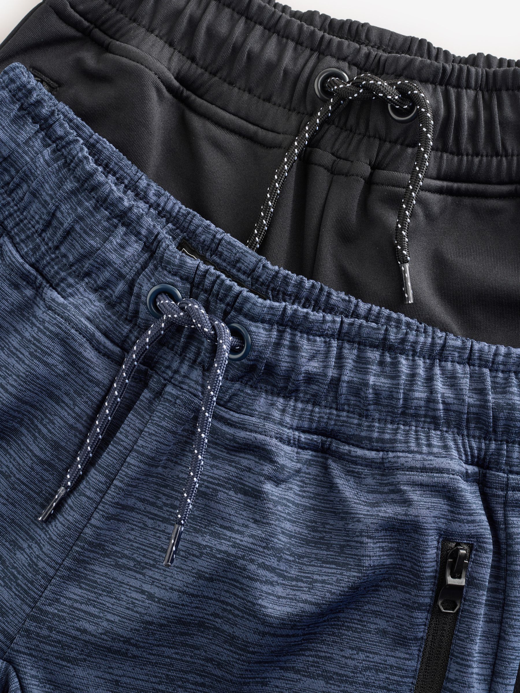 Zwart/marineblauw - Slim-fit joggingbroek met ritszak (3-16jr)