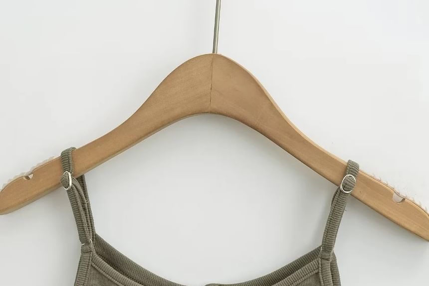 Asiris - Effen crop top met knoopjes en slim-fit
