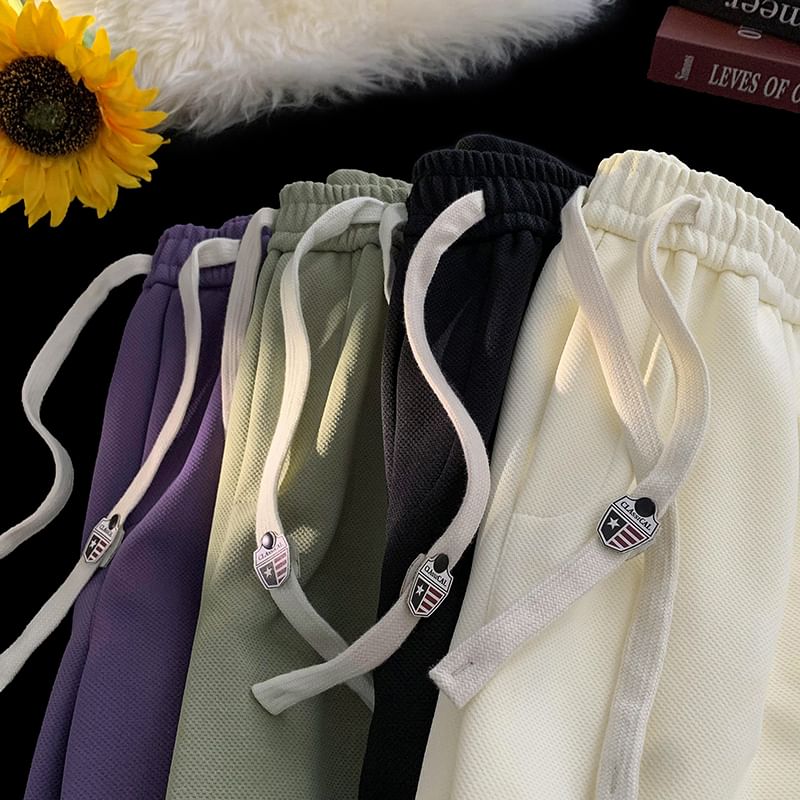 Kimeya - Zweetshorts met trekkoord in de taille, letters en nummers