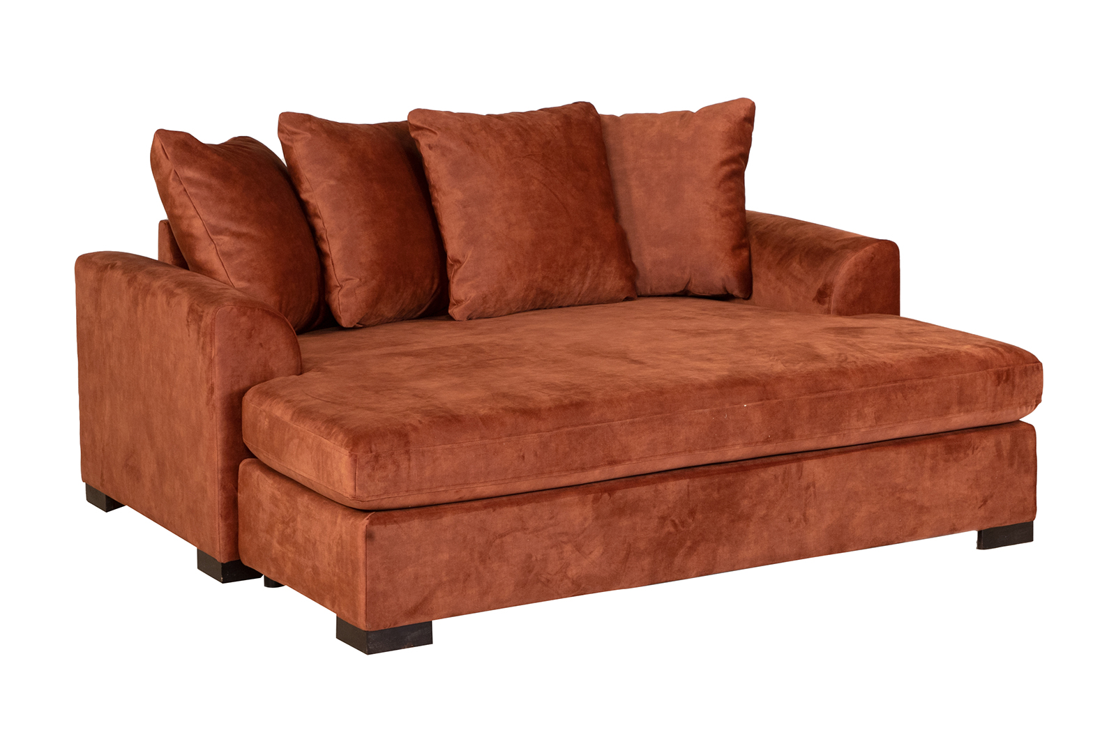 Boston daybed I velurtekstil Fuji Copper med sorte ben og løse puter.