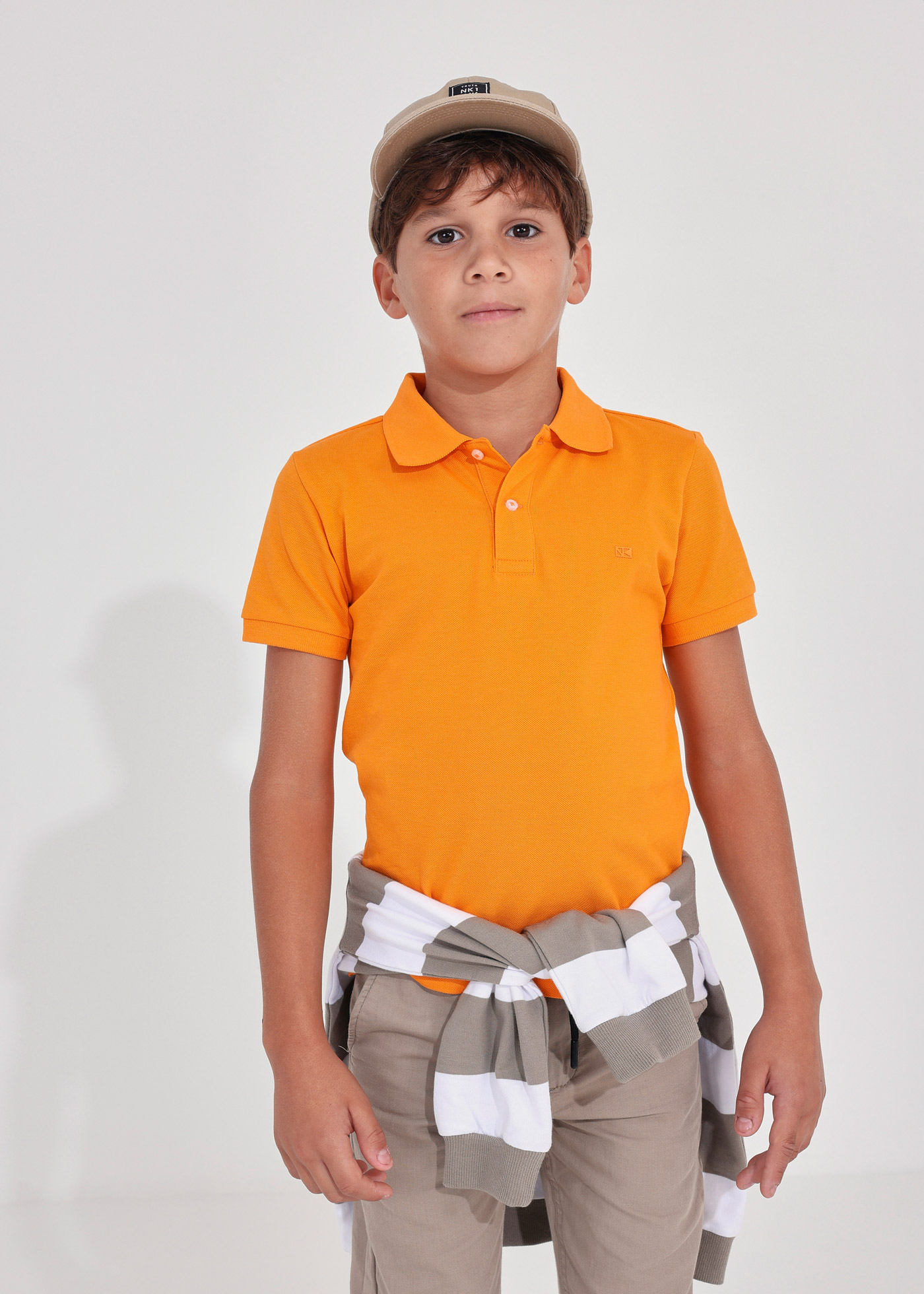 Camisa polo de manga curta em algodão sustentável para meninos
