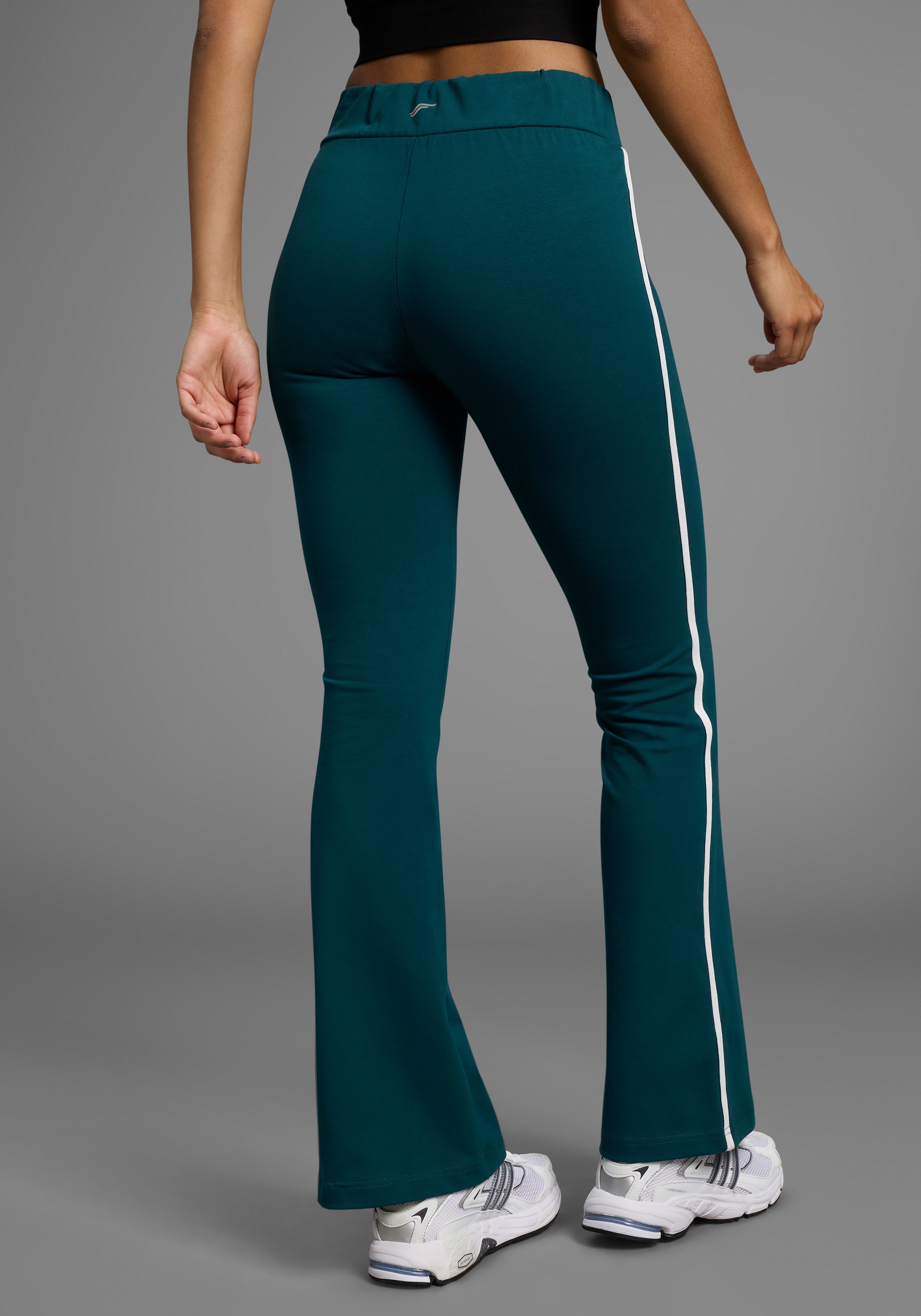 FAYN SPORTS Leggings  Logo als Reflektorprint