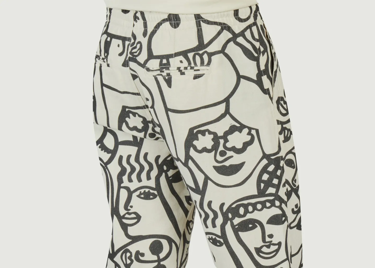 Pantalon imprimé visages Ovada x Twotma Olow