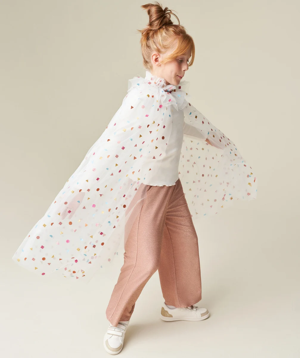 DÉGUISEMENT CAPE EN TULLE BLANC AVEC FORMES COLORÉES PAILLETÉES