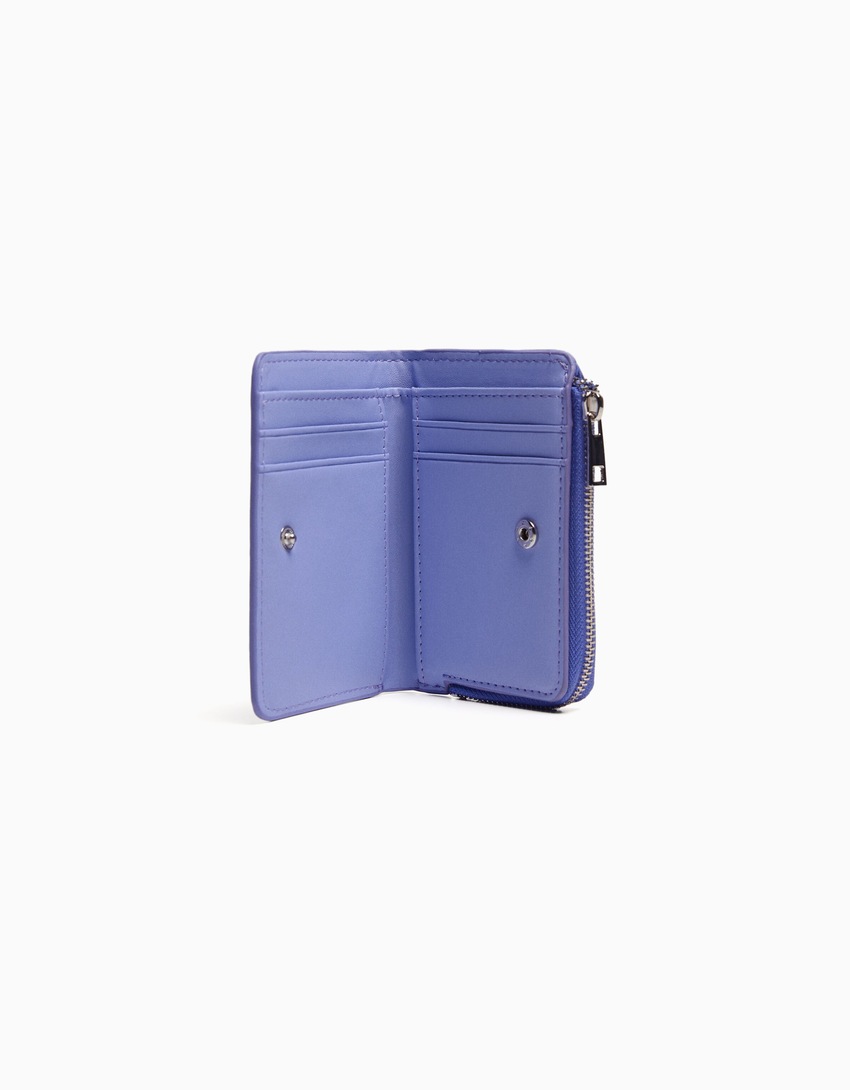 Bolsa com estampa animal em imitação de verniz em relevo