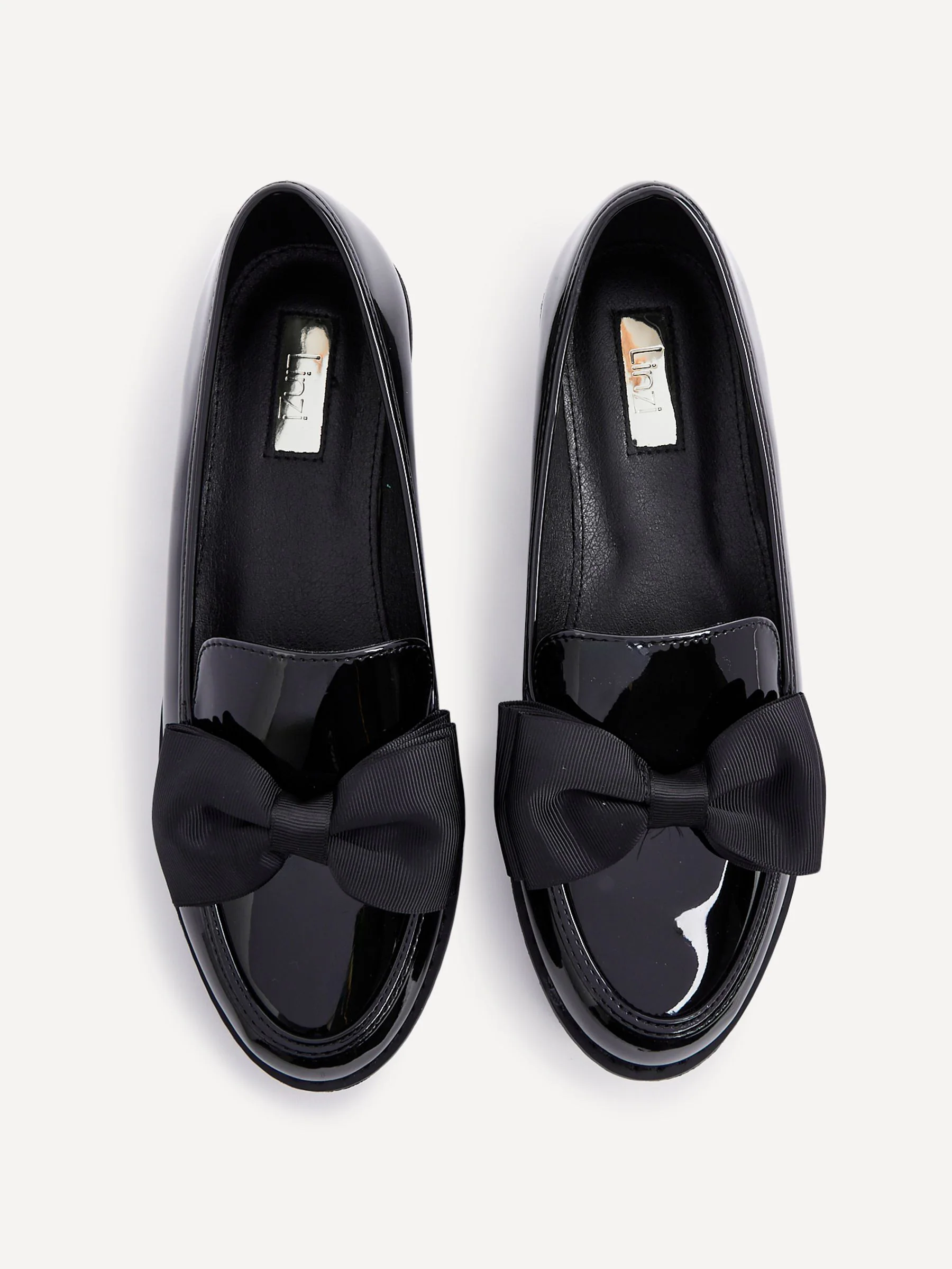 Zwart - Linzi Cathy loafers met plateauzool en grote strik