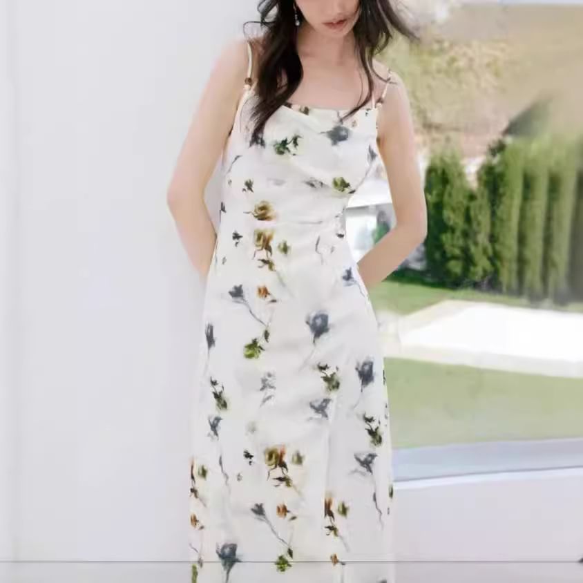 Puffie - Midi-jurk met spaghettibandjes en bloemenprint