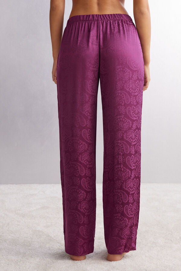 Calças compridas de veludo jacquard acetinado com estampa paisley.