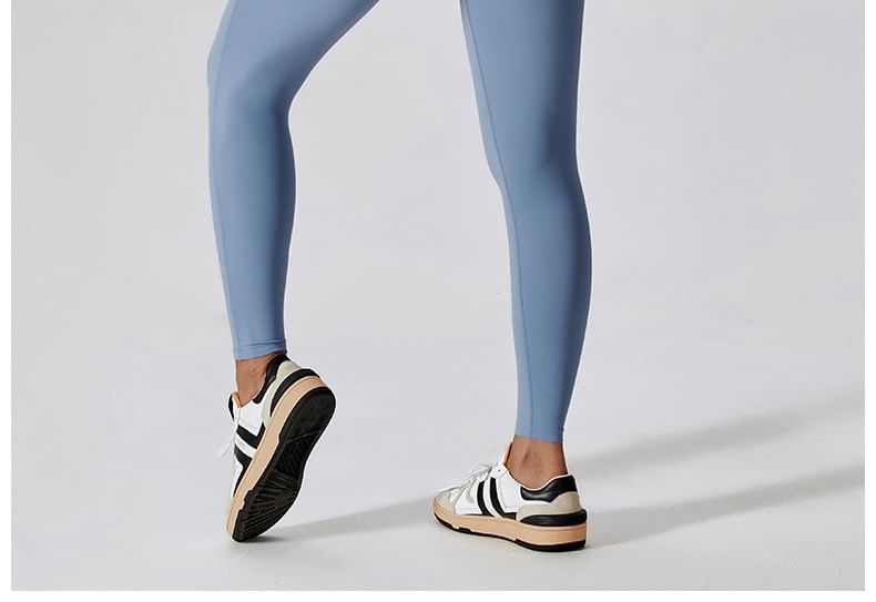 Skinniano - Sportjumpsuit met korte mouwen en halve rits