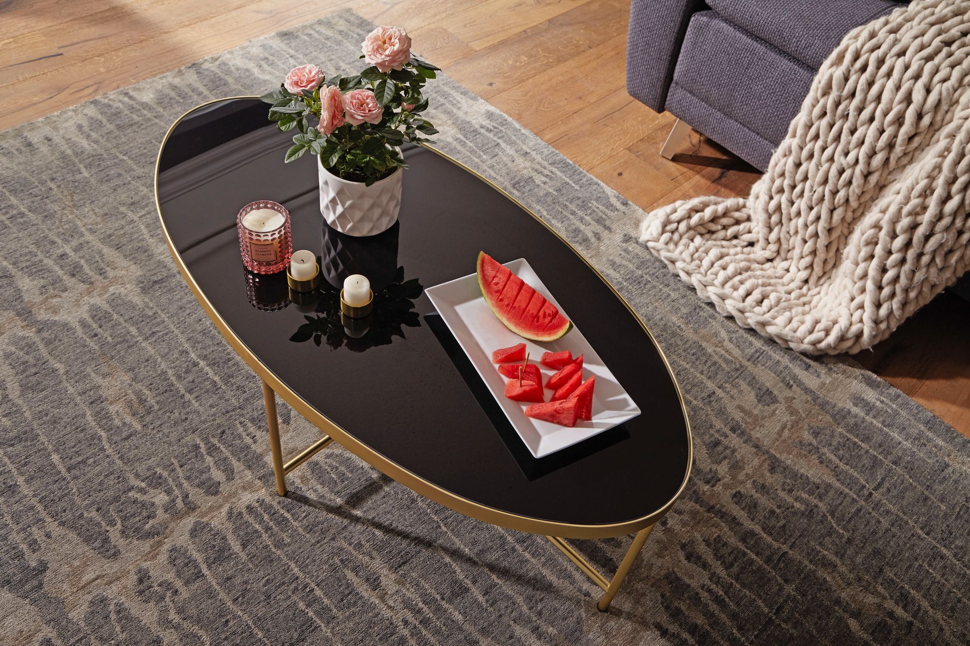 KADIMA DESIGN VILS Couchtisch, oval, Glasplatte, filigranes Metallgestell, Schwarz/Gold, 110x56 cm