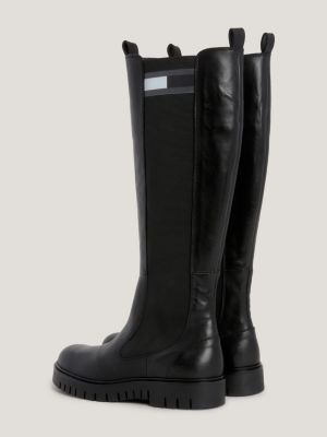 Botas de cano alto em couro com detalhes em fita