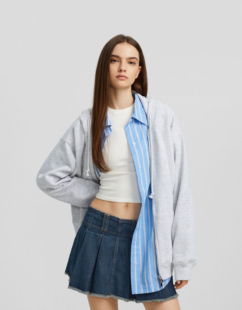 saias-calça plissadas em denim desbotado