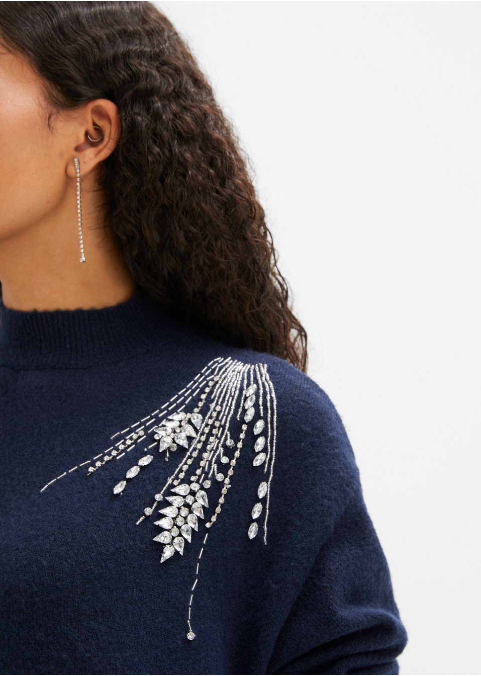 Pull avec éléments décoratifs
