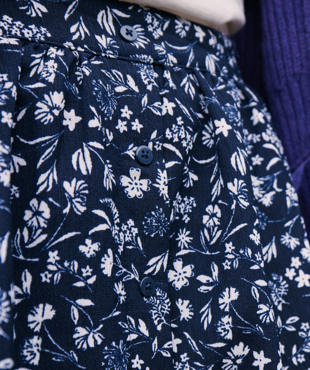 JUPE BOUTONNÉE FILLE EN FIBRES RECYCLÉES BLEU MARINE ET IMPRIMÉ FLEURI BLANC