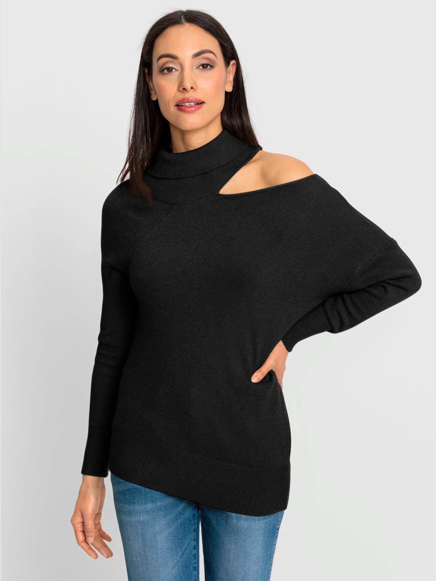 Pull à col roulé découpe raffinée