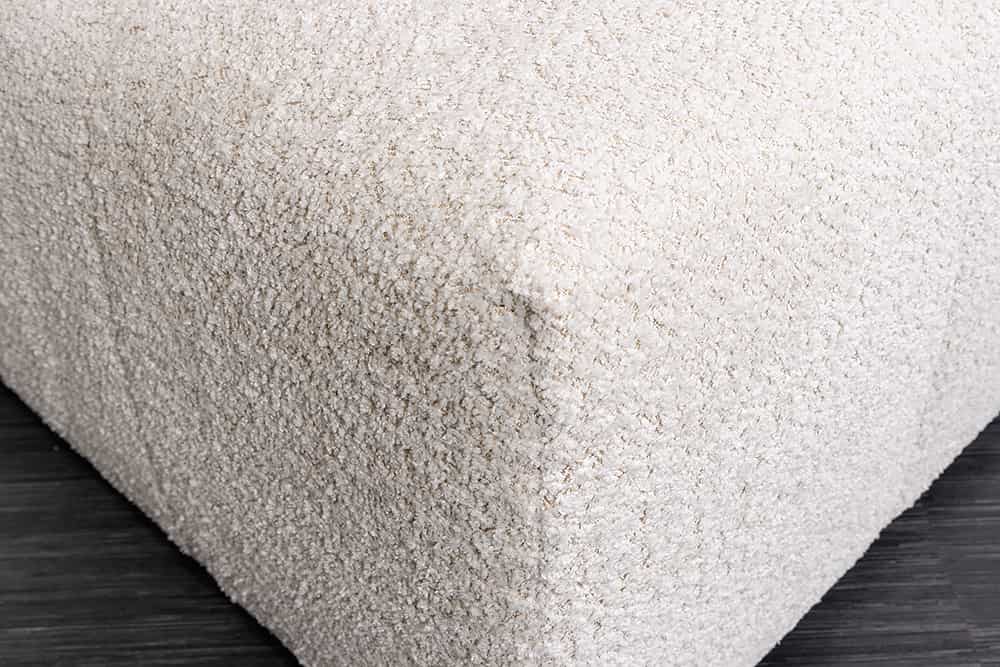 Moderner Hocker ROYAL 120cm champagner beige Bouclé Federkern Sitzhocker
