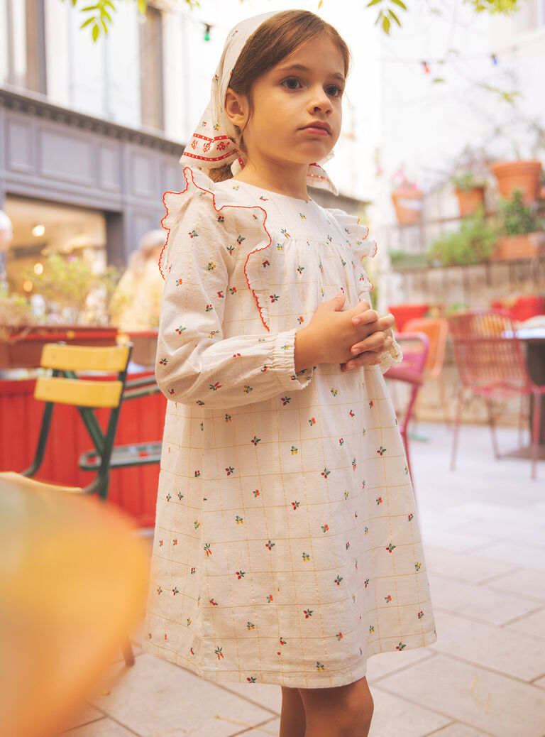 Robe écrue à volants
