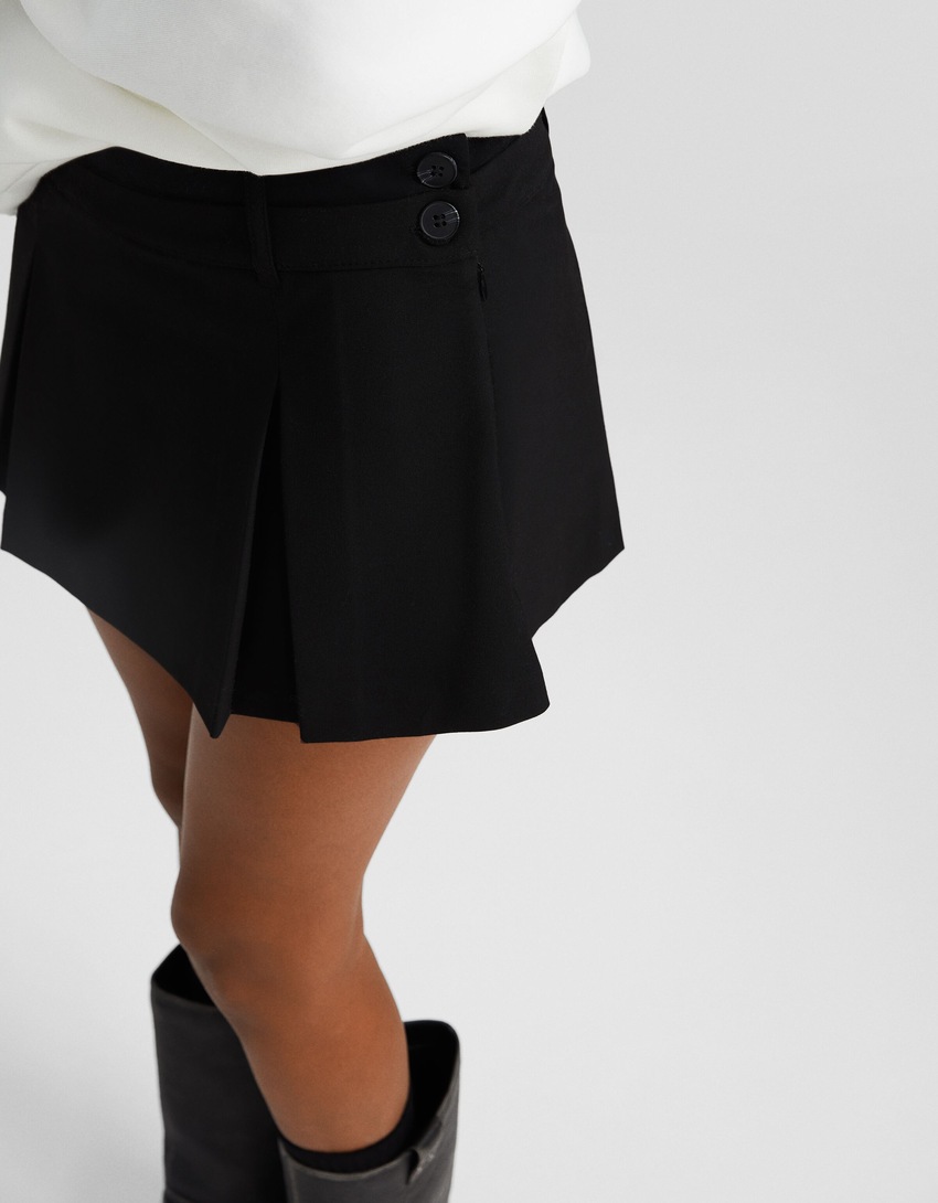 Saia-calça sob medida com pregas caixa