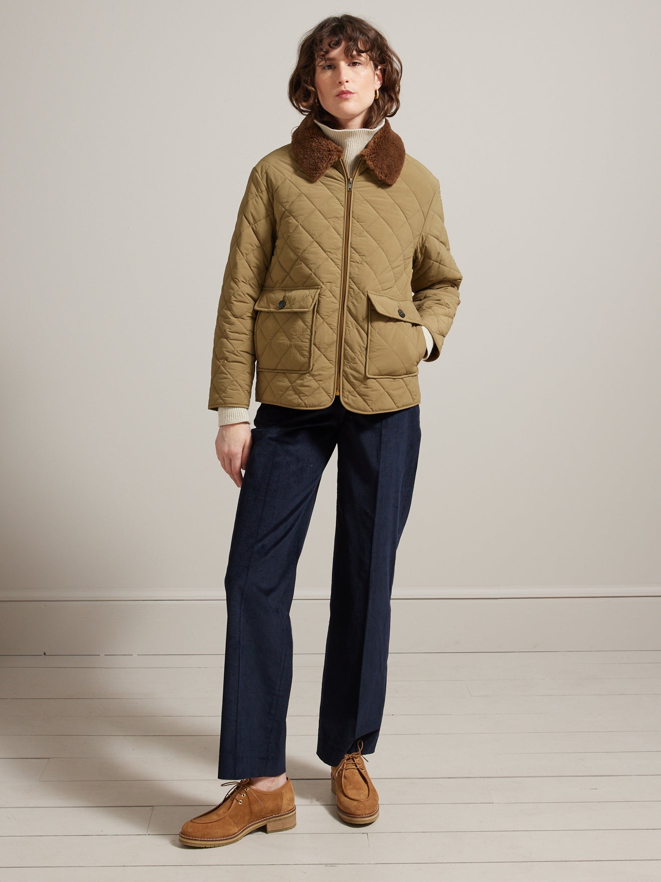 Veste matelassée col fausse fourrure femme