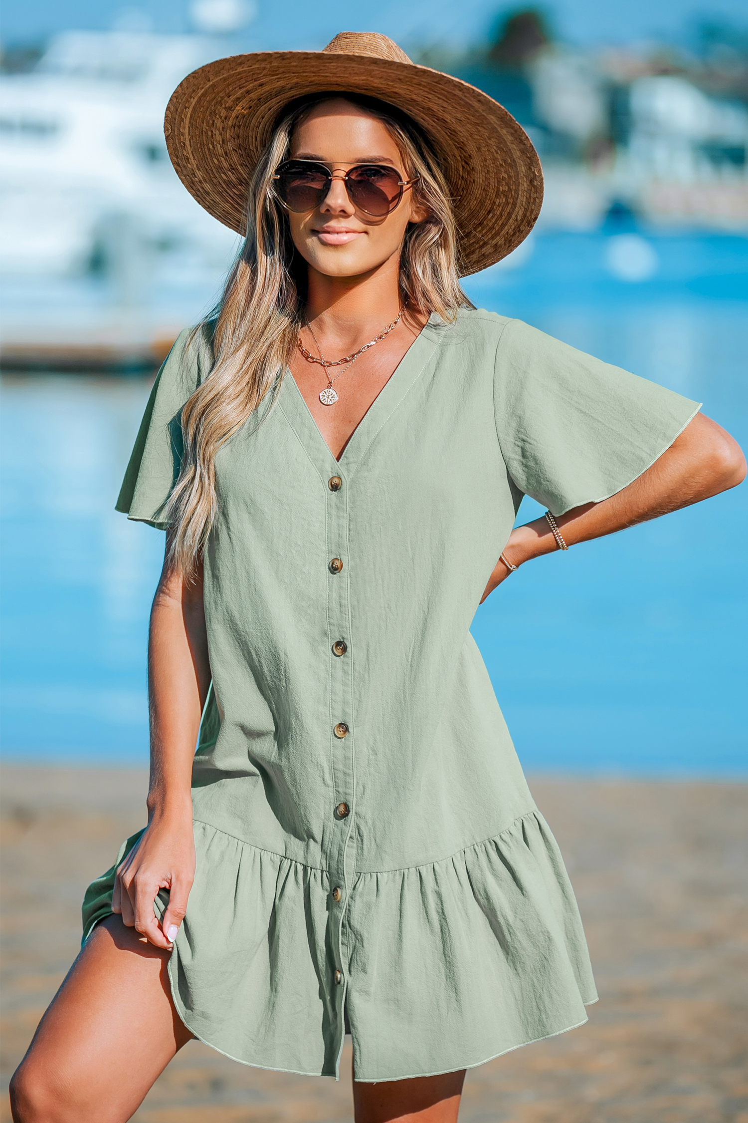 Robe en pur coton avec col en V et boutons à volants