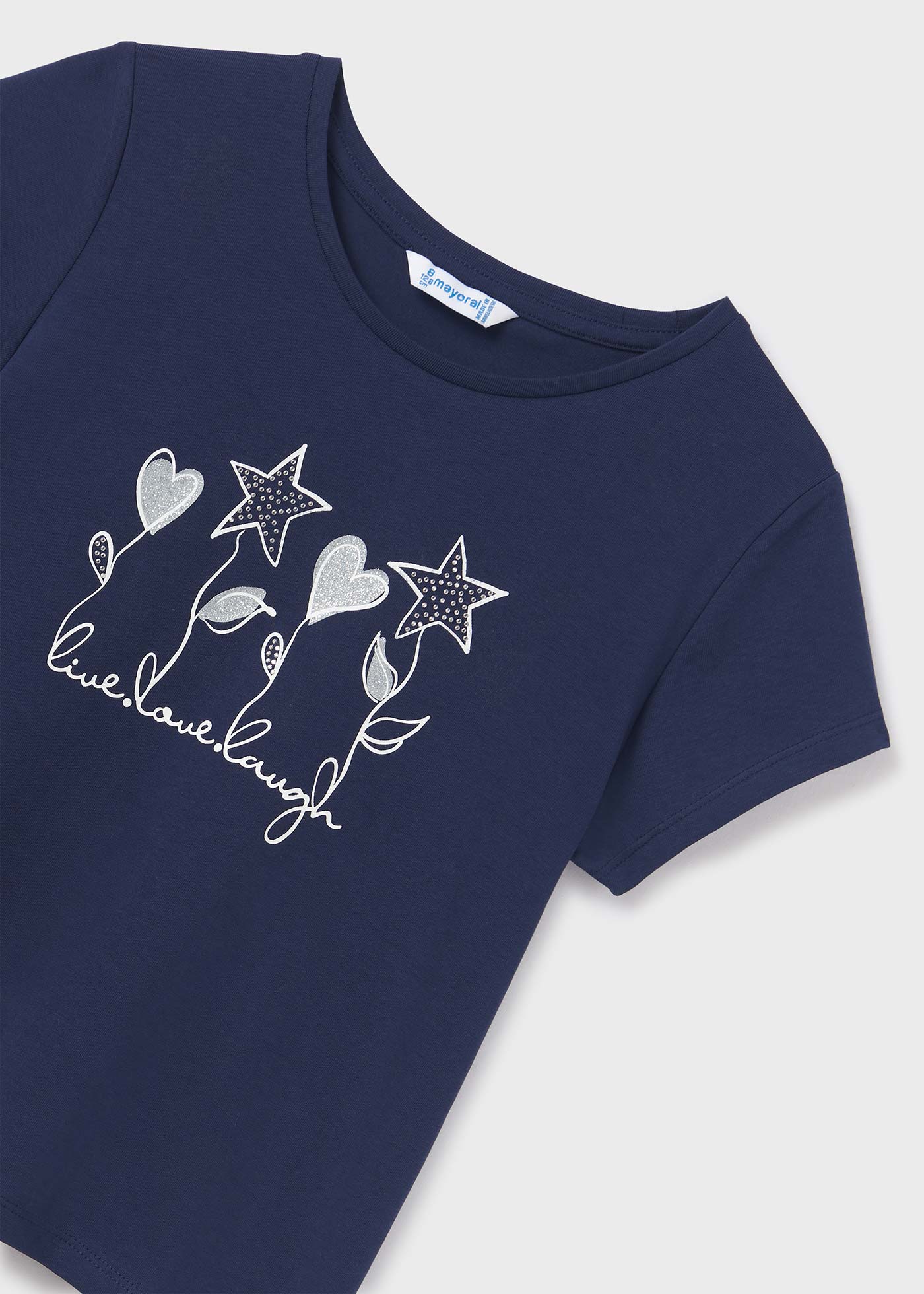 Camiseta de manga curta para meninas, feita de algodão sustentável.
