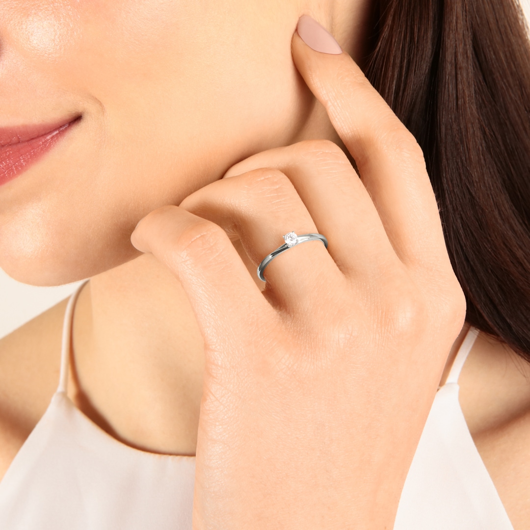 Solitärring 750/18 K Weissgold mit Diamant 0.12ct H/Si