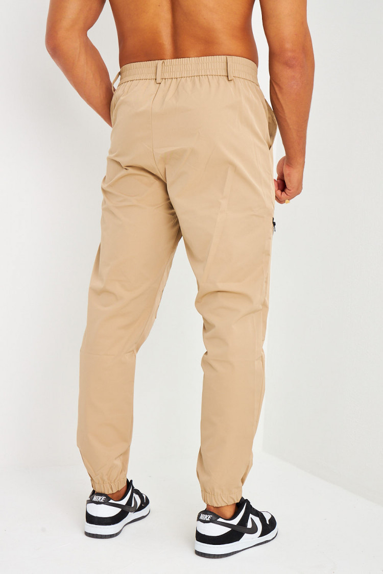 Pantalon de jogging beige foncé zippé