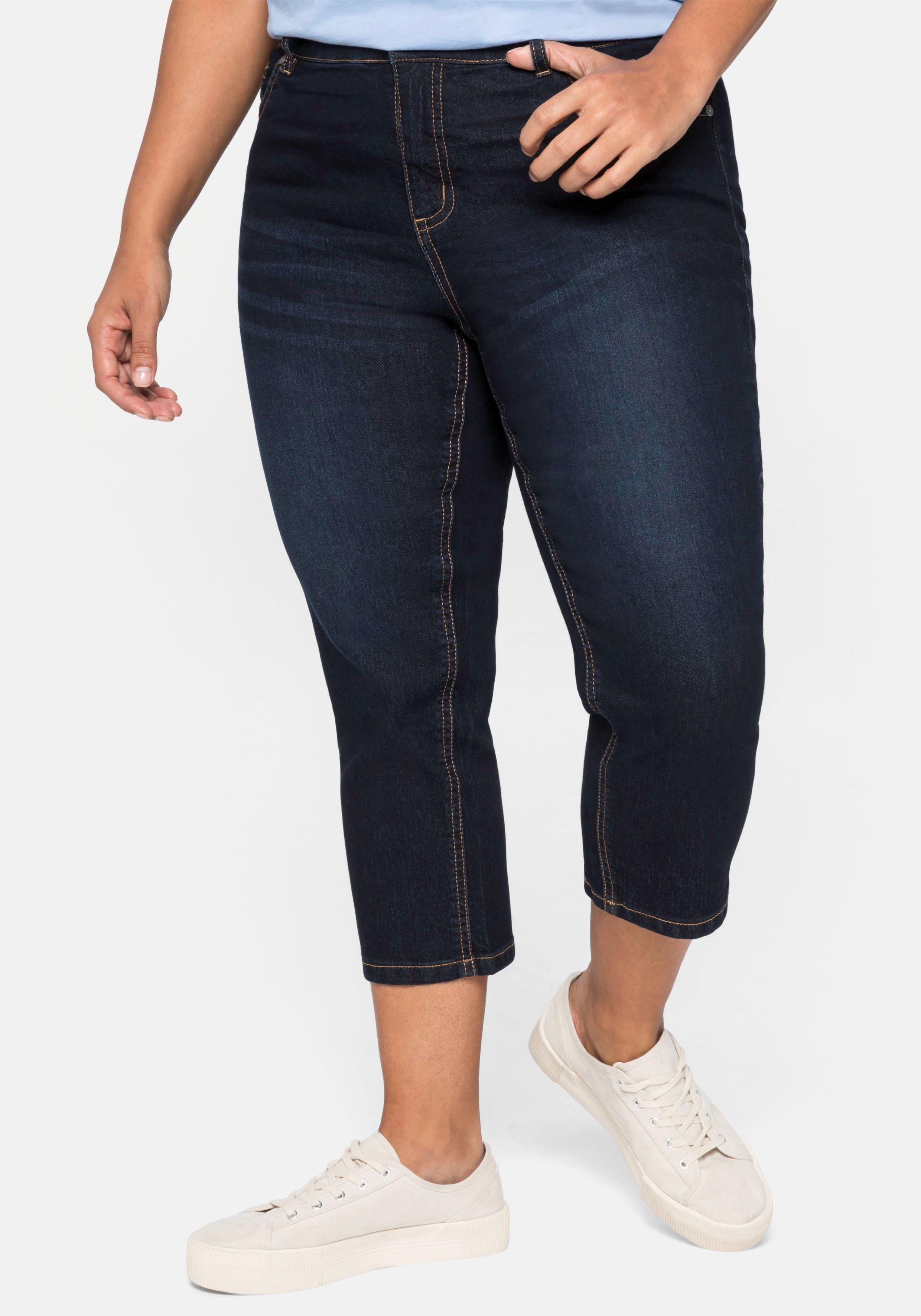 Caprijeans mit Kontrastnähten und Catfaces