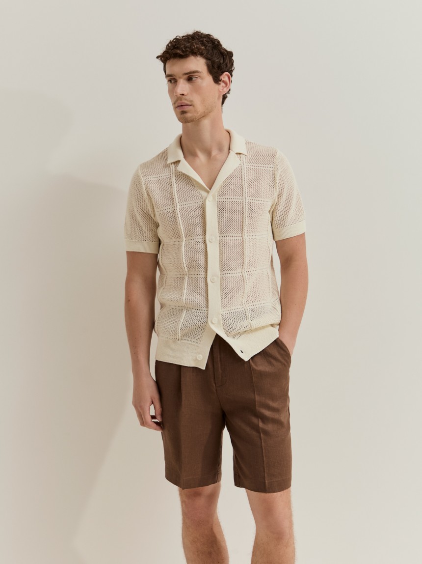 Polo tricotado com botões
