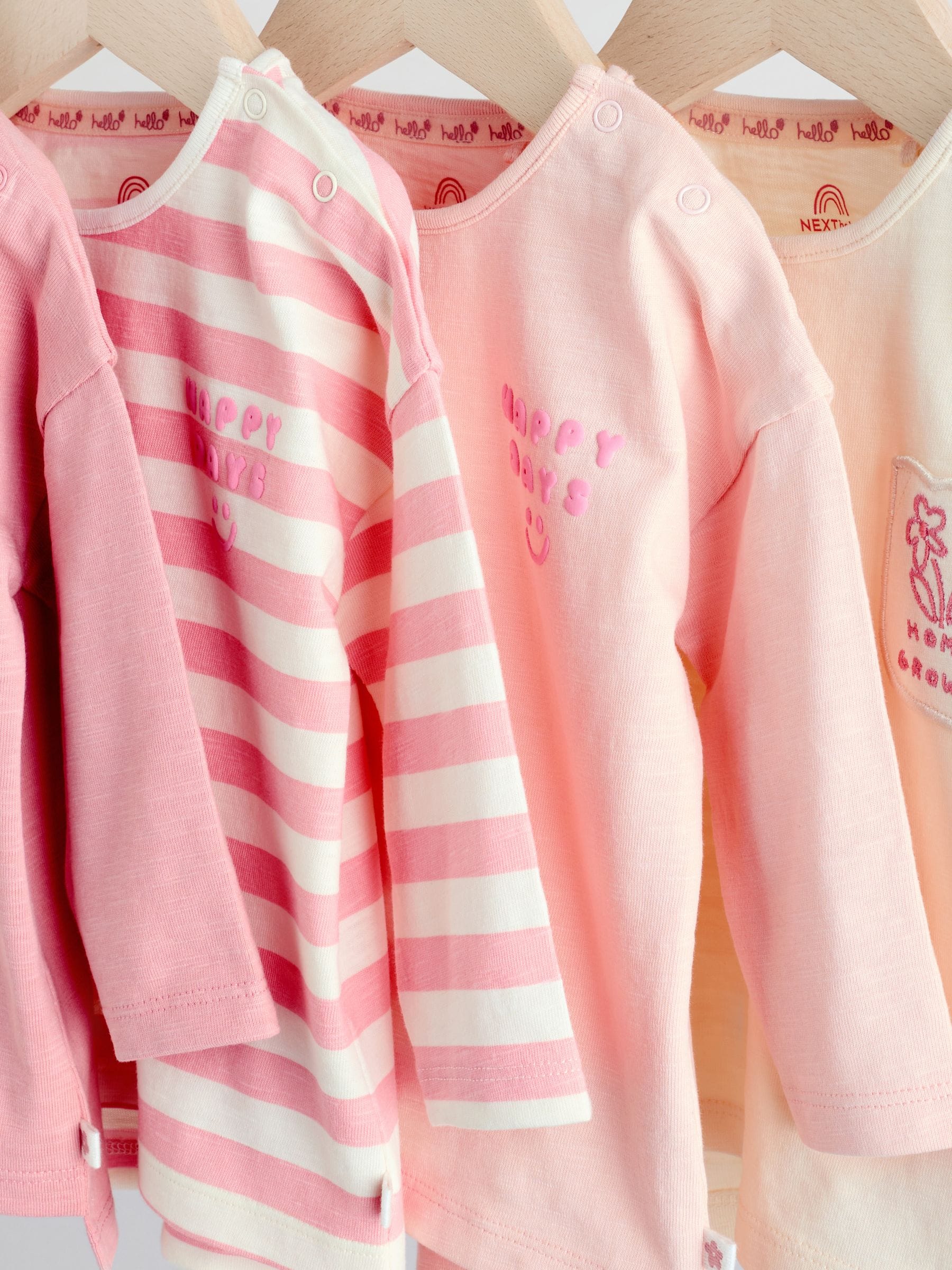 Roze Strepen/Slogan - Verpakking van 4 Baby Tops met Lange mouwen (0mnd -2jr)