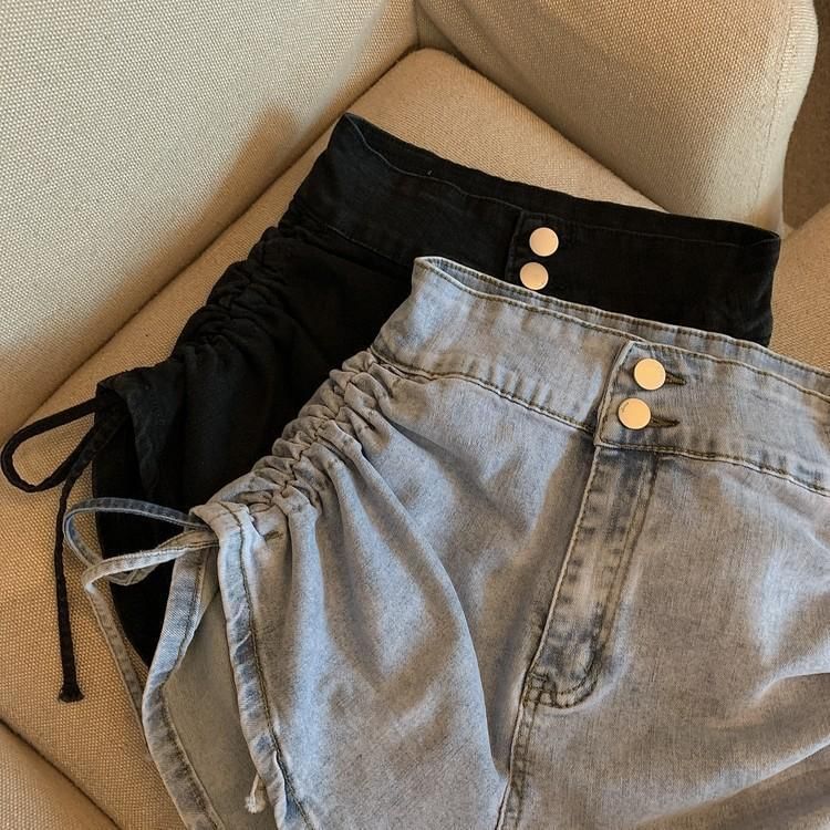 Sisyphi - Denim shorts met hoge taille en plooien