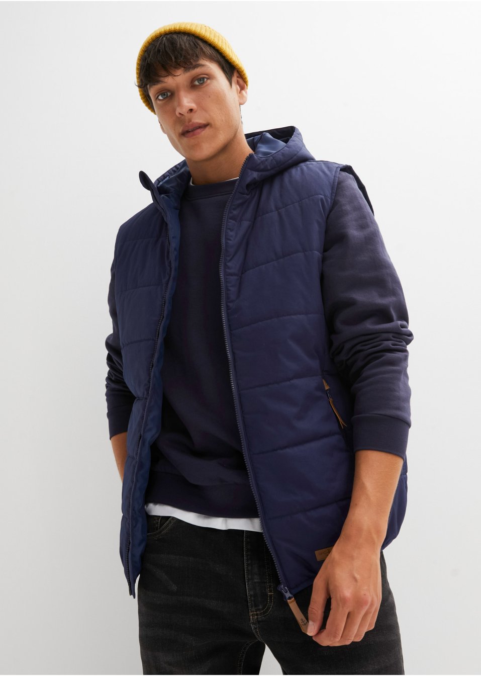 Veste sans manches matelassée à capuche