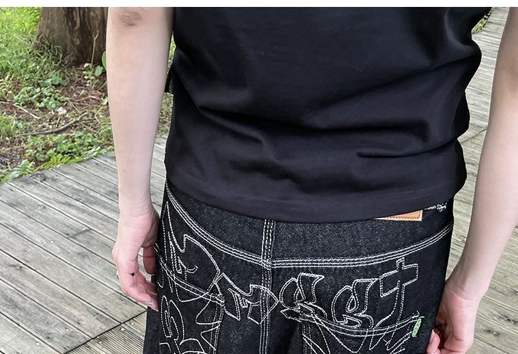 Jerolenea - Middelhoge geborduurde contrasterende gestikte gewassen wijde jeans