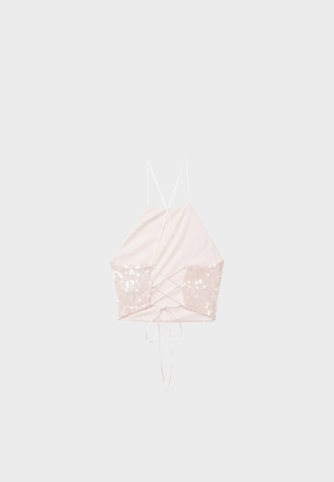 Top com decote halter e lantejoulas