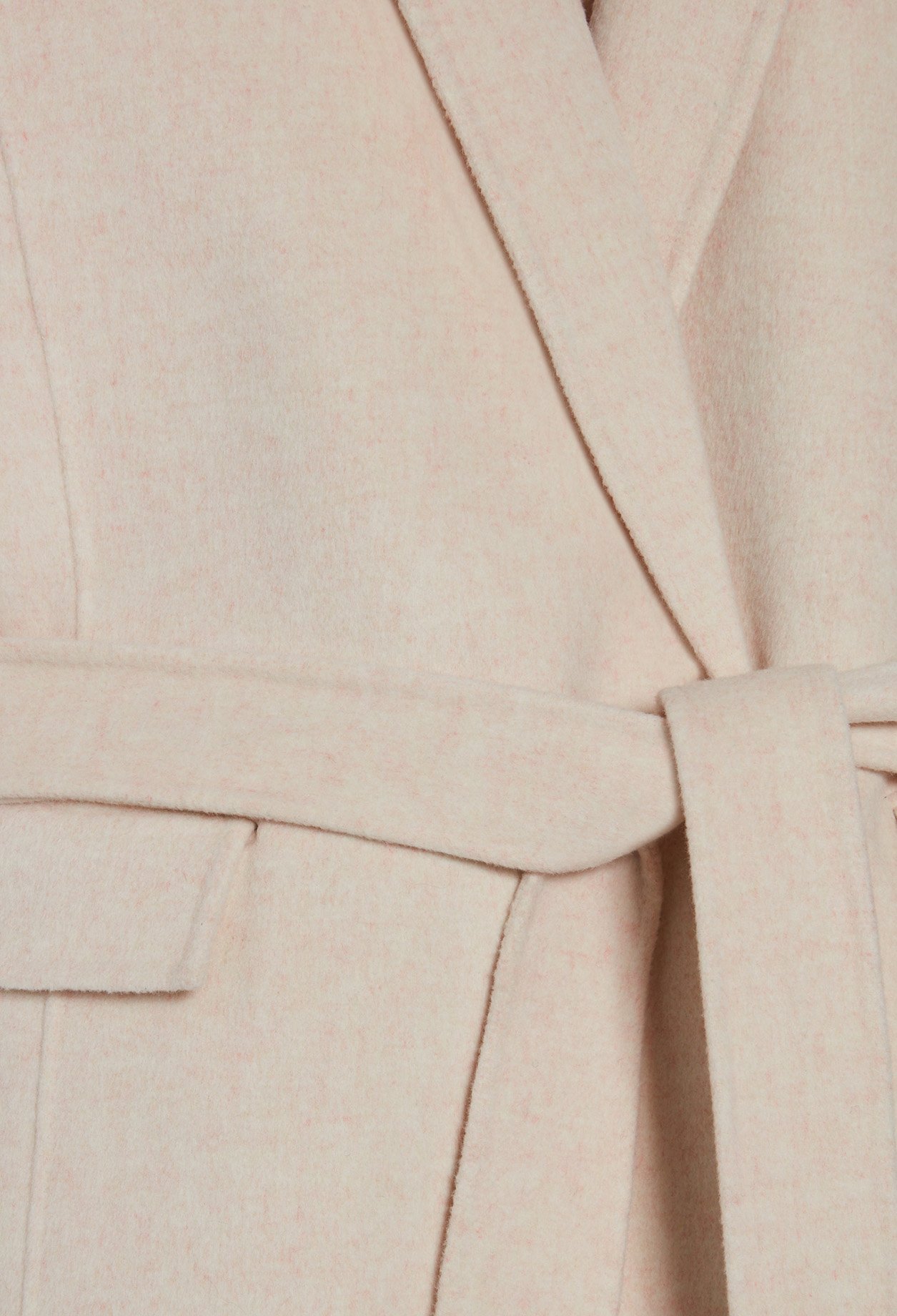 Manteau vanille laine sans manche