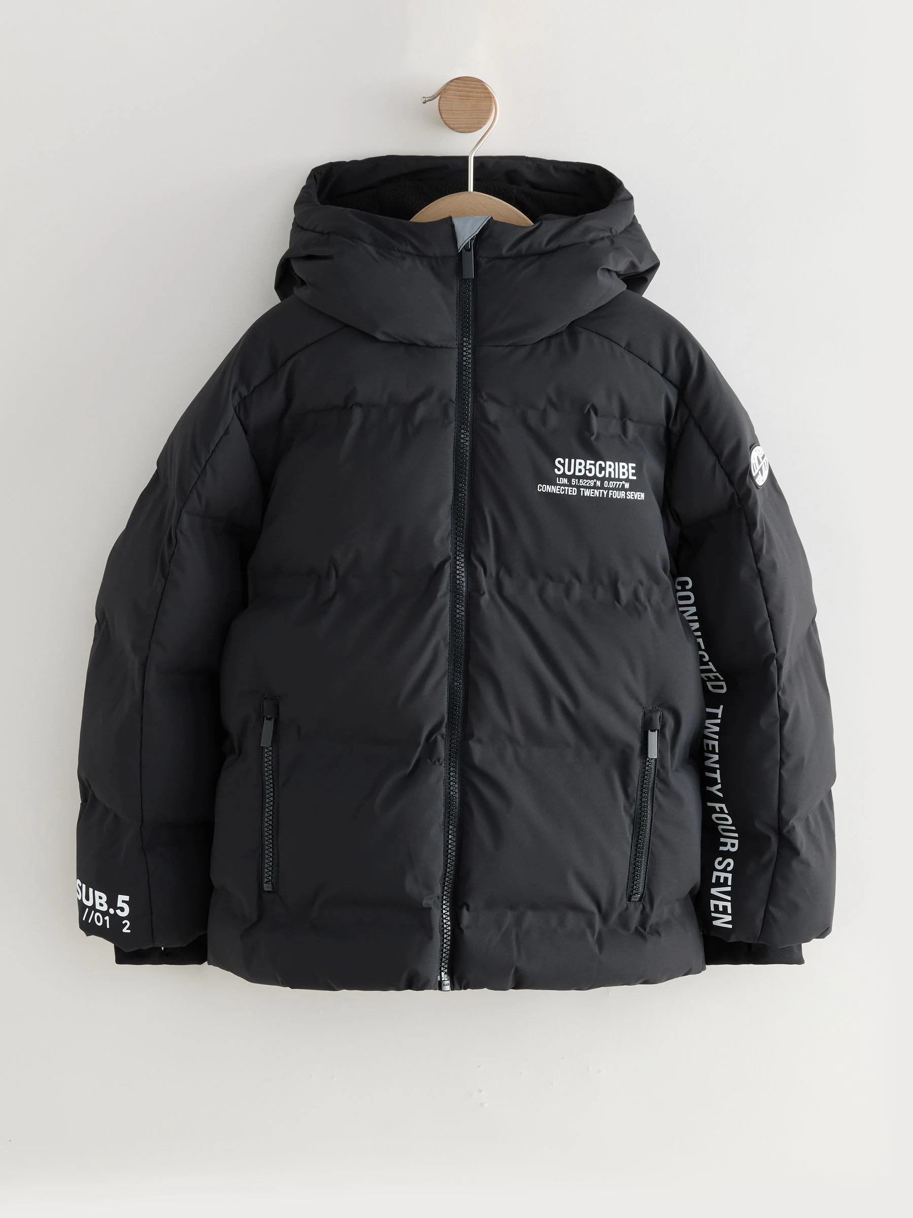 Zwart/wit - Regenbestendige gewatteerde jas met microfleece voering (3-17jr)